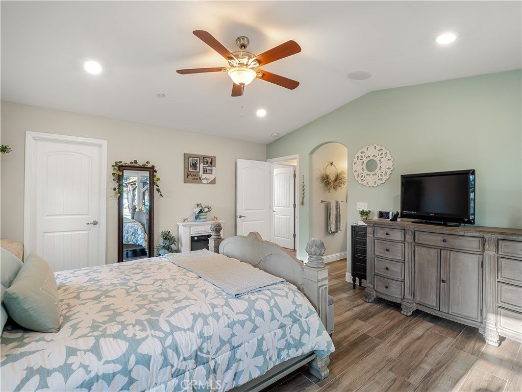 Bedroom, Fireplace, Interior, Recessed Lighting, Wood Texture Flooring