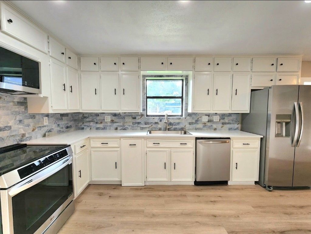 Interior, Kitchen, Recessed Lighting, Stainless Steel Appliances, Wood Texture Flooring