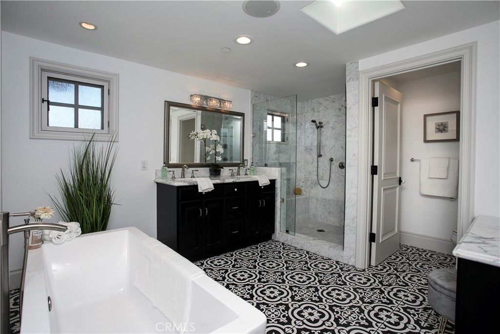 Bathroom, Dual Sink Vanities, Glass Shower, Interior, Marble Walls, Recessed Lighting
