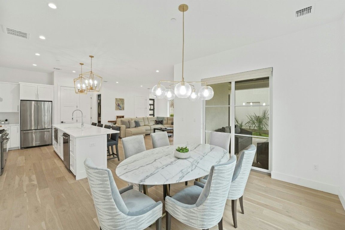 Dining room, Interior, Kitchen, Living room, Pendant Lights, Recessed Lighting, Stainless Steel Appliances, Wood Texture Flooring