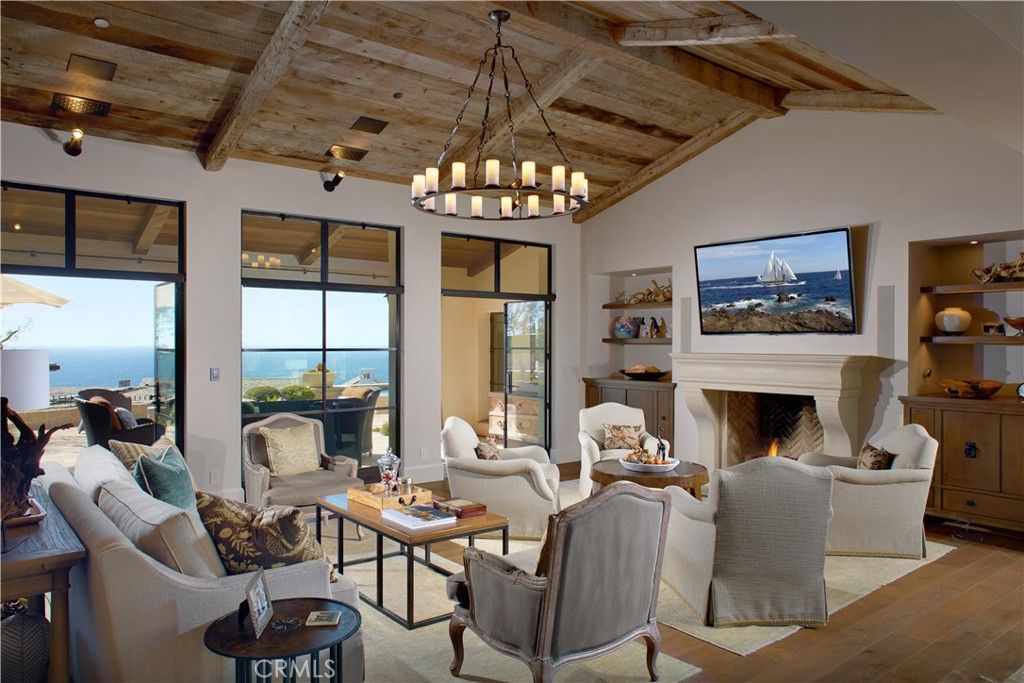Chandelier, Fireplace, Interior, Living room, Water, Wooden Beams, Wooden Ceilings, Wood Texture Flooring