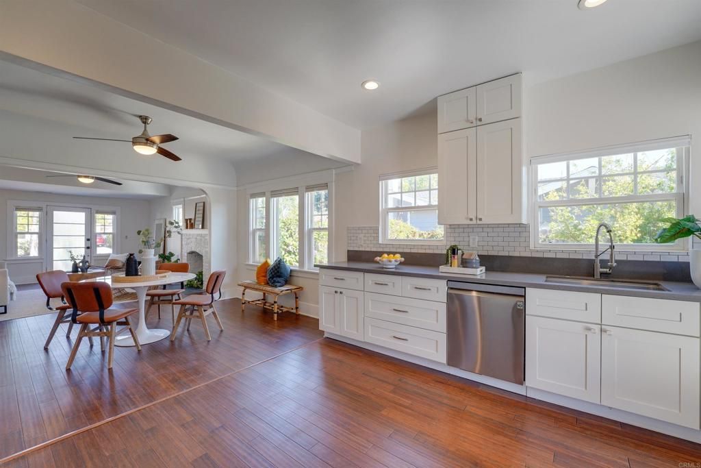Dining room, Interior, Kitchen, Recessed Lighting, Stainless Steel Appliances, Wood Texture Flooring