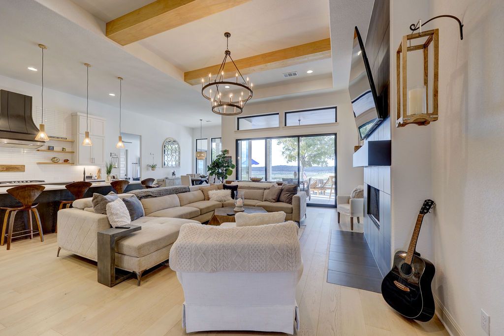 Chandelier, Fireplace, Interior, Kitchen, Living room, Pendant Lights, Recessed Lighting, Wooden Beams, Wood Texture Flooring