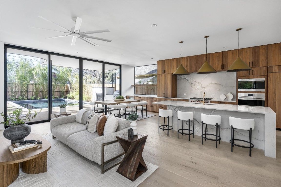 Dining room, Interior, Kitchen, Living room, Pendant Lights, Recessed Lighting, Stainless Steel Appliances, Wood Texture Flooring