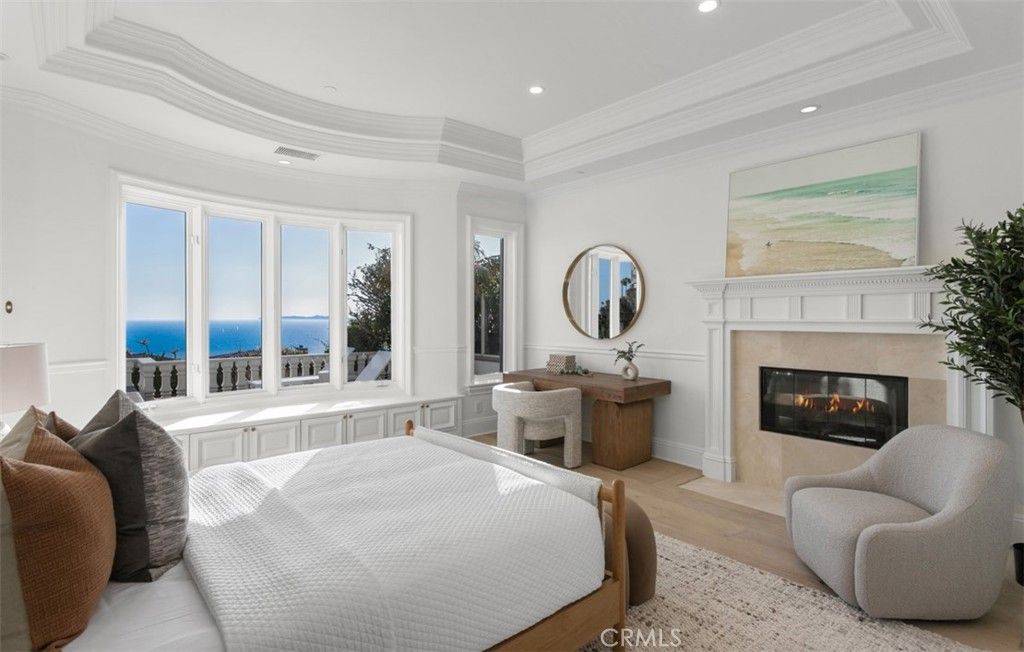 Bedroom, Fireplace, Interior, Recessed Lighting, Water, Wood Texture Flooring