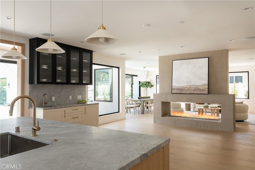 Dining room, Fireplace, Interior, Kitchen, Pendant Lights, Recessed Lighting, Wood Texture Flooring