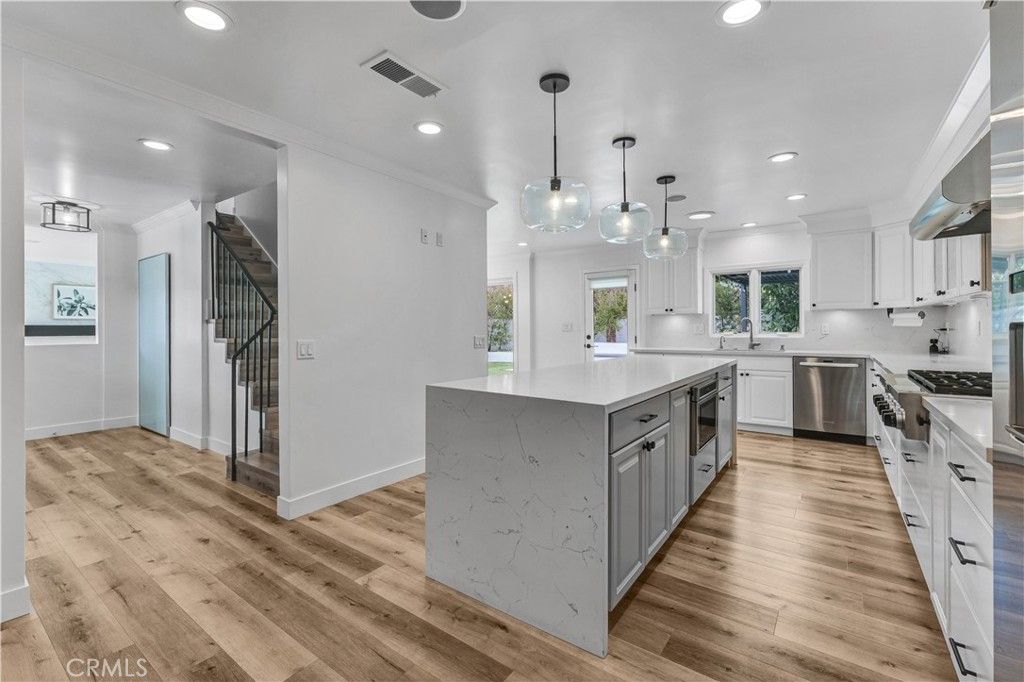 Interior, Kitchen, Pendant Lights, Recessed Lighting, Stainless Steel Appliances, Wood Texture Flooring
