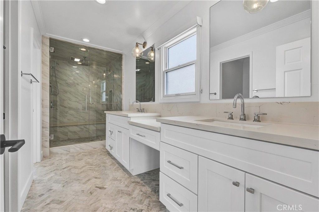 Bathroom, Dual Sink Vanities, Glass Shower, Interior, Marble Walls, Recessed Lighting