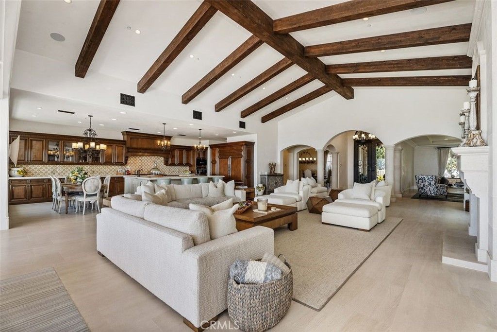 Chandelier, Dining room, Fireplace, Interior, Kitchen, Living room, Pendant Lights, Recessed Lighting, Wooden Beams