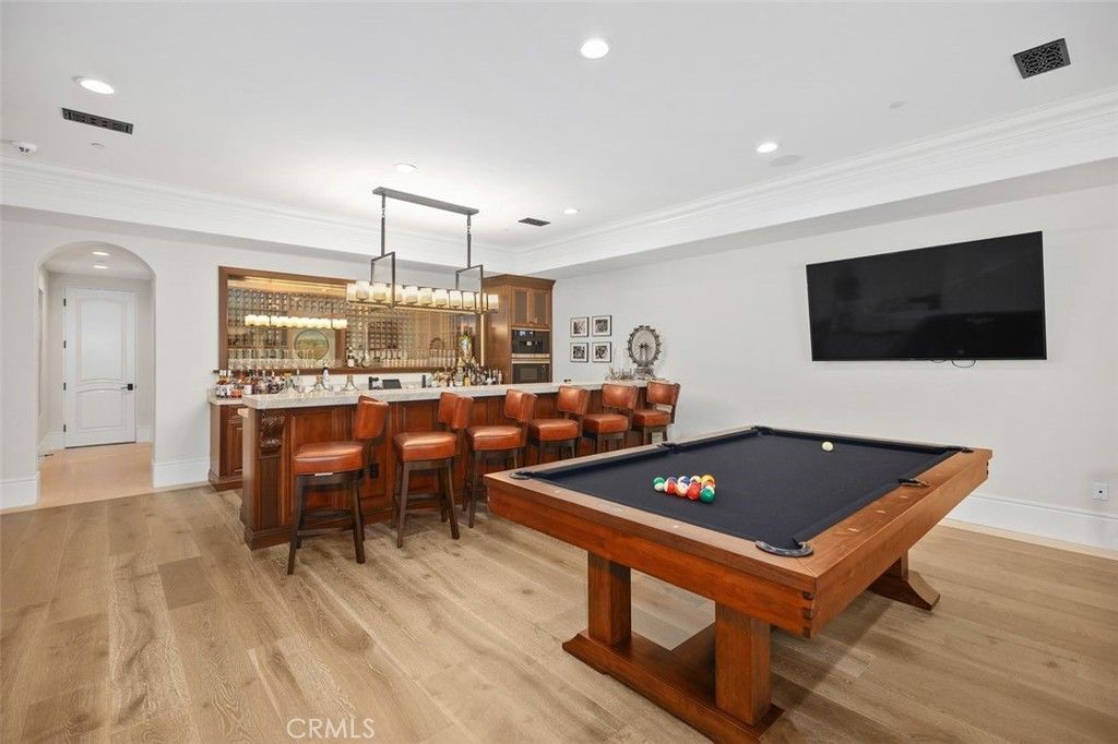 Billiard Table, Chandelier, Game Room, Interior, Pendant Lights, Recessed Lighting, Wood Texture Flooring