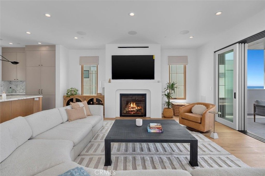 Fireplace, Interior, Living room, Recessed Lighting, Water, Wood Texture Flooring
