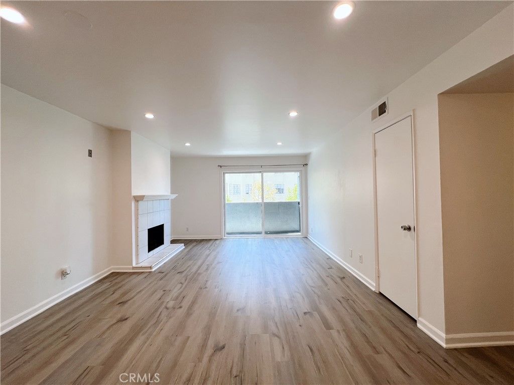 Empty room, Fireplace, Interior, Recessed Lighting, Wood Texture Flooring