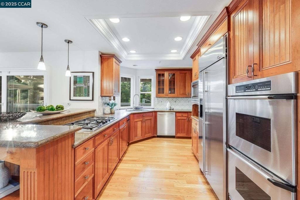 Interior, Kitchen, Pendant Lights, Recessed Lighting, Stainless Steel Appliances, Wood Texture Flooring