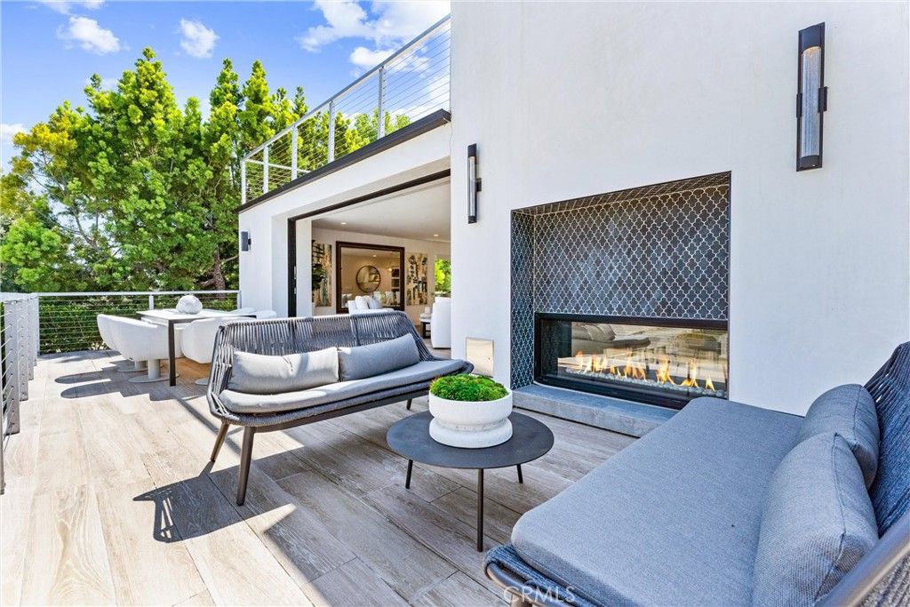 Exterior, Fireplace, Wood Texture Flooring