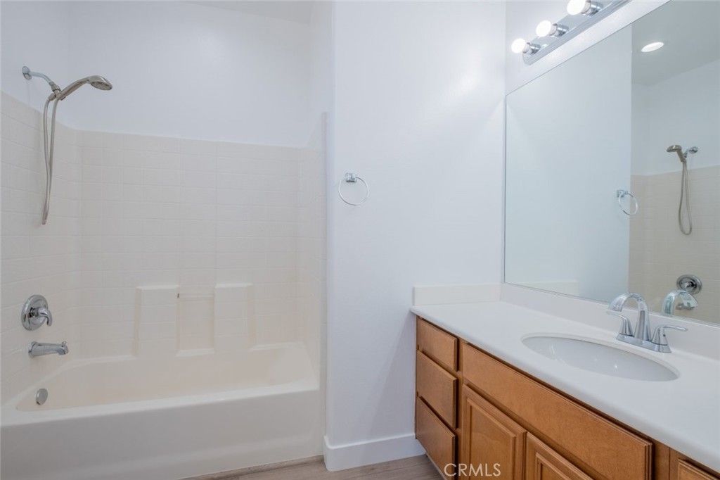 Bathroom, Dual Sink Vanities, Interior, Recessed Lighting, Wood Texture Flooring
