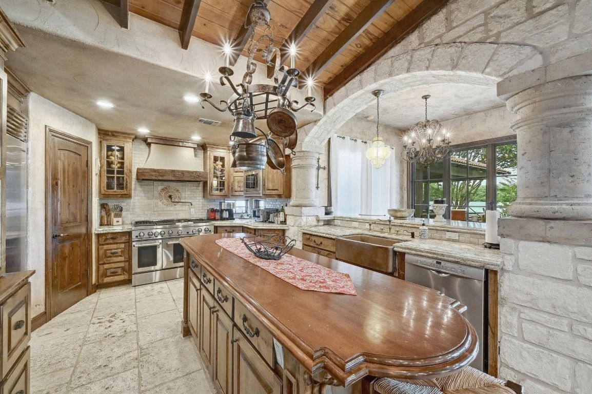Chandelier, Interior, Kitchen, Pendant Lights, Recessed Lighting, Stainless Steel Appliances, Stone Walls, Wooden Beams, Wooden Ceilings