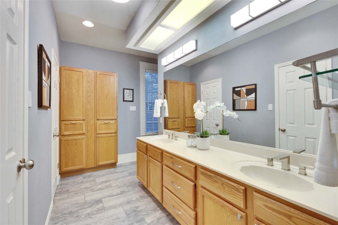 Bathroom, Dual Sink Vanities, Interior, Recessed Lighting, Wood Texture Flooring