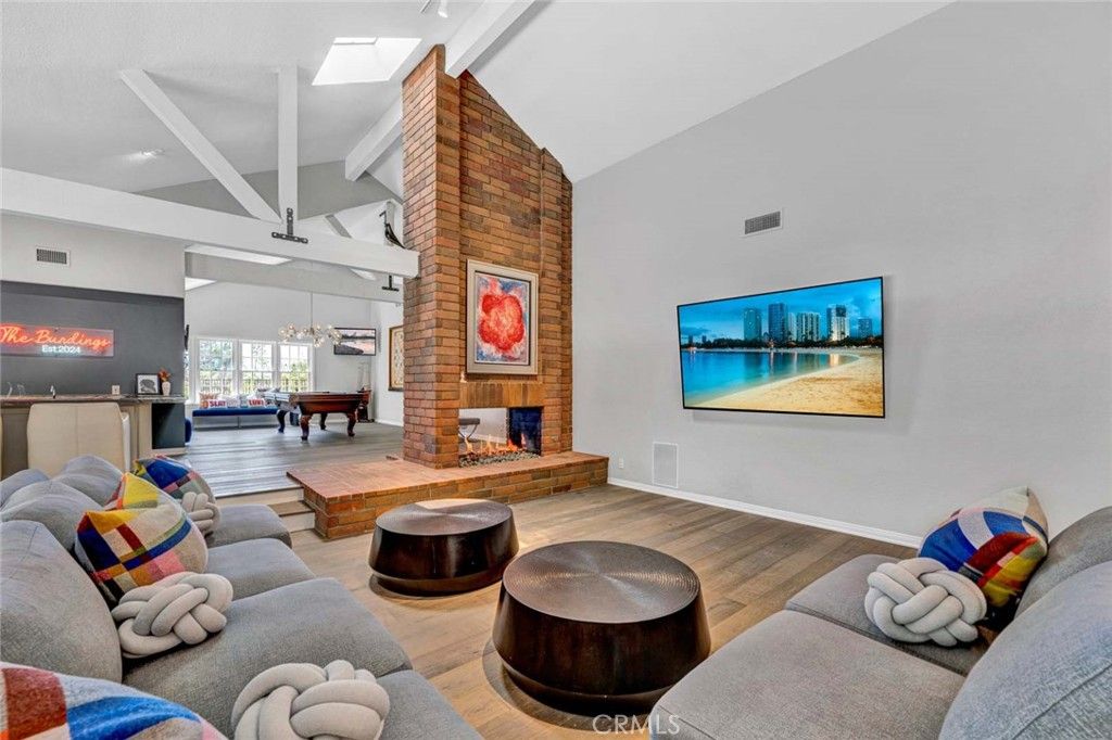 Billiard Table, Fireplace, Game Room, Interior, Living room, Pendant Lights, Wood Texture Flooring