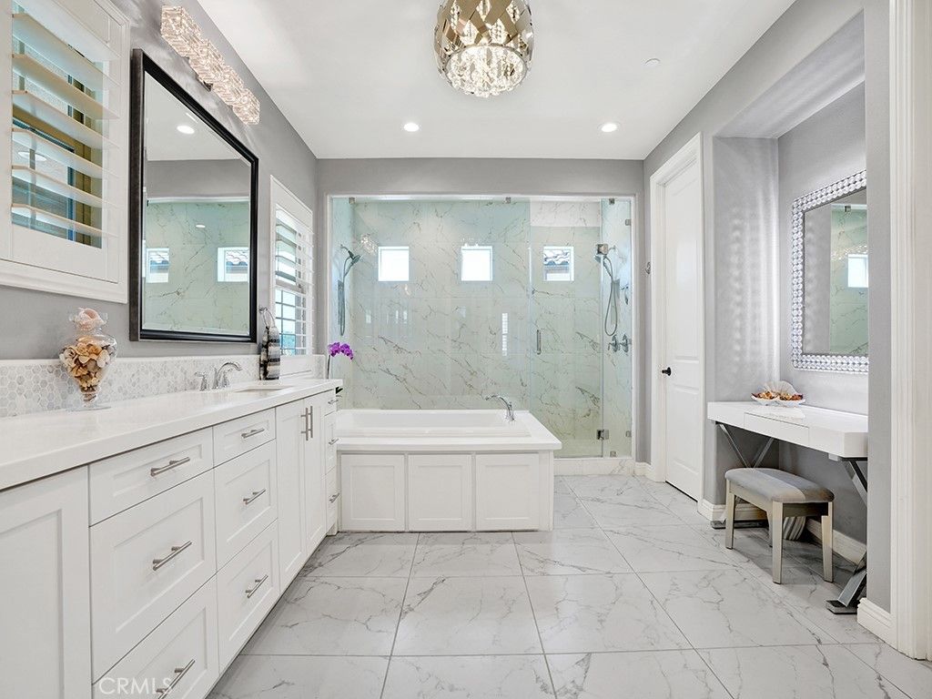 Bathroom, Dual Sink Vanities, Glass Shower, Interior, Marble, Marble Walls, Recessed Lighting