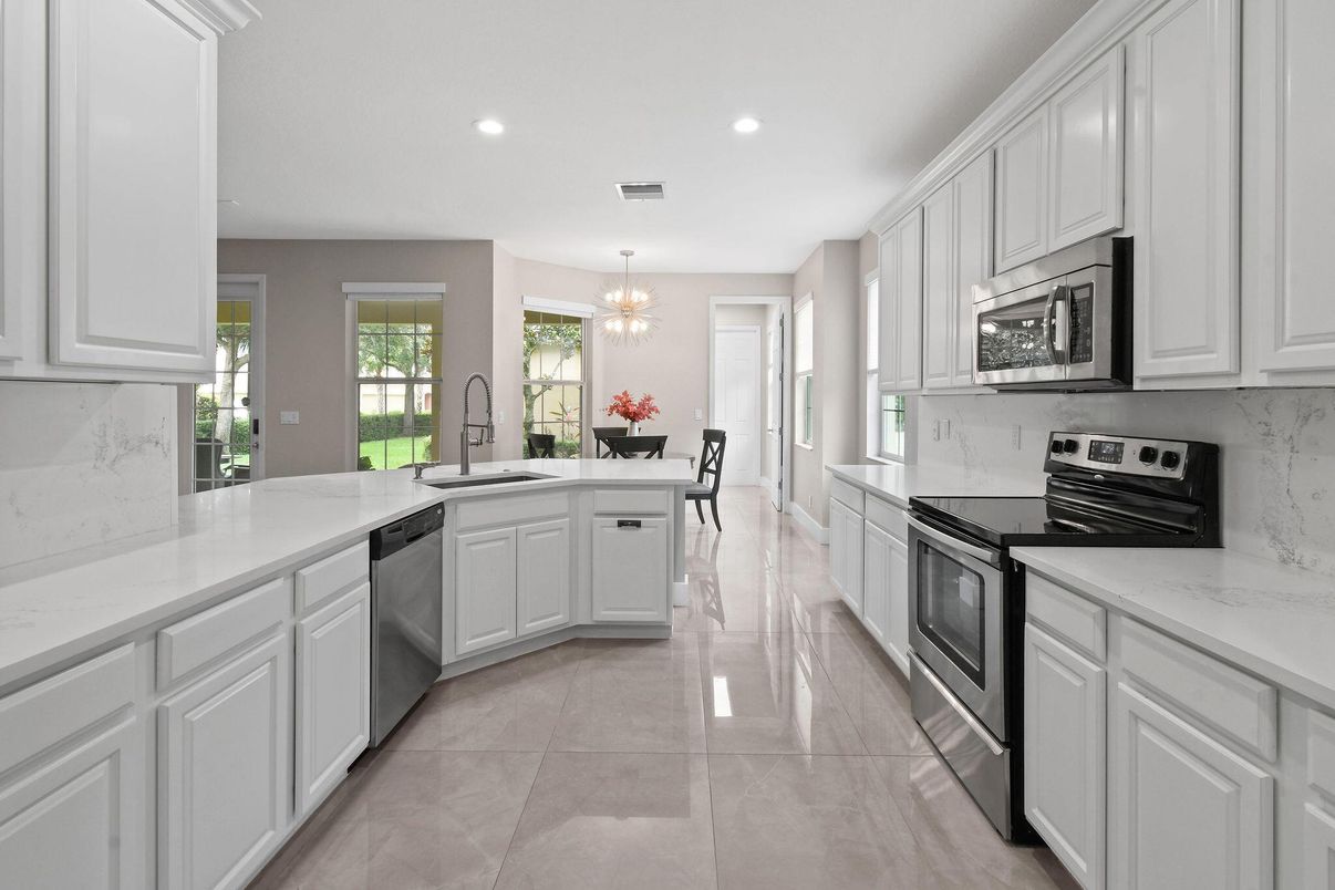 Chandelier, Dining room, Interior, Kitchen, Marble Walls, Recessed Lighting, Stainless Steel Appliances