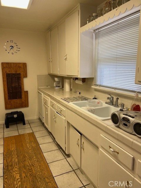 Interior, Kitchen, Tile Countertops, Wood Texture Flooring