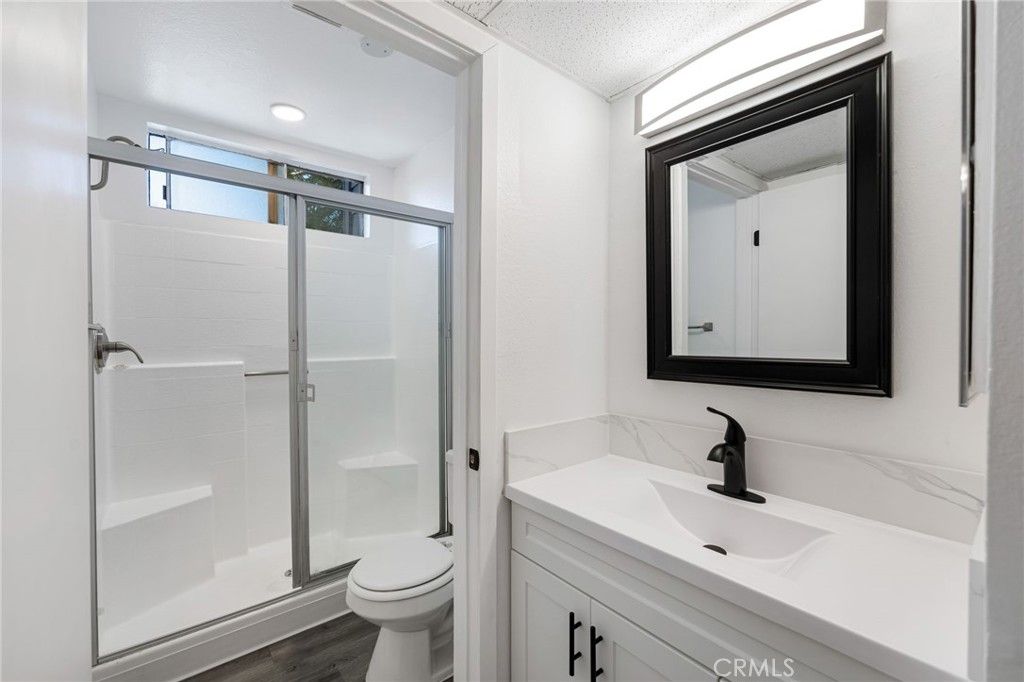 Bathroom, Glass Shower, Interior, Recessed Lighting, Wood Texture Flooring