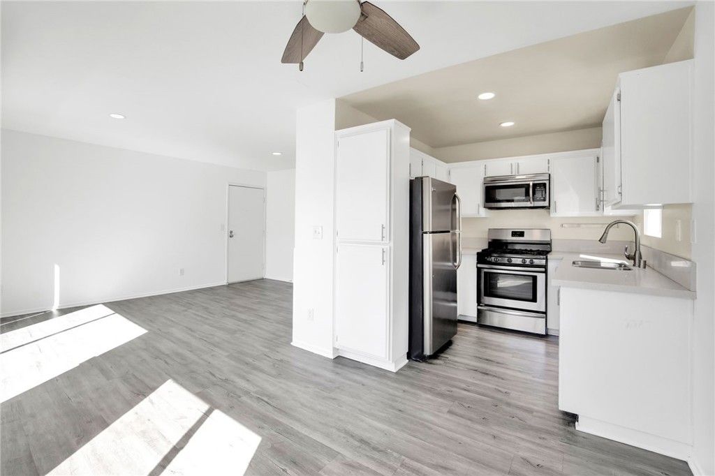 Interior, Kitchen, Recessed Lighting, Stainless Steel Appliances, Wood Texture Flooring