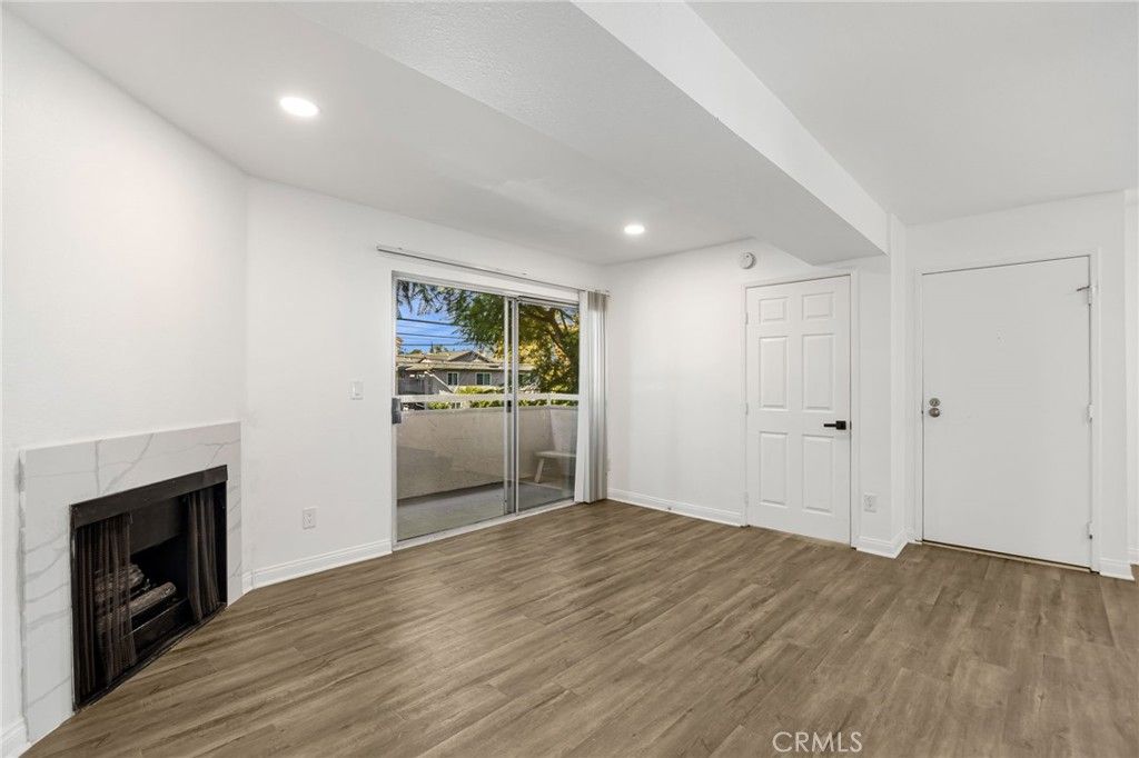 Empty room, Fireplace, Interior, Recessed Lighting, Wood Texture Flooring