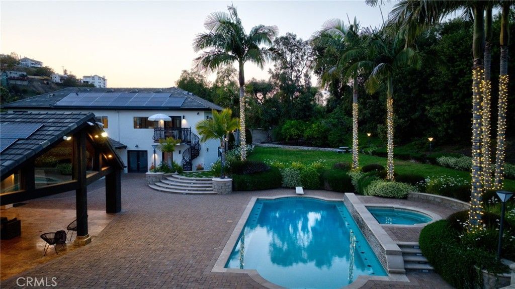 Exterior, Pool, Solar Panels
