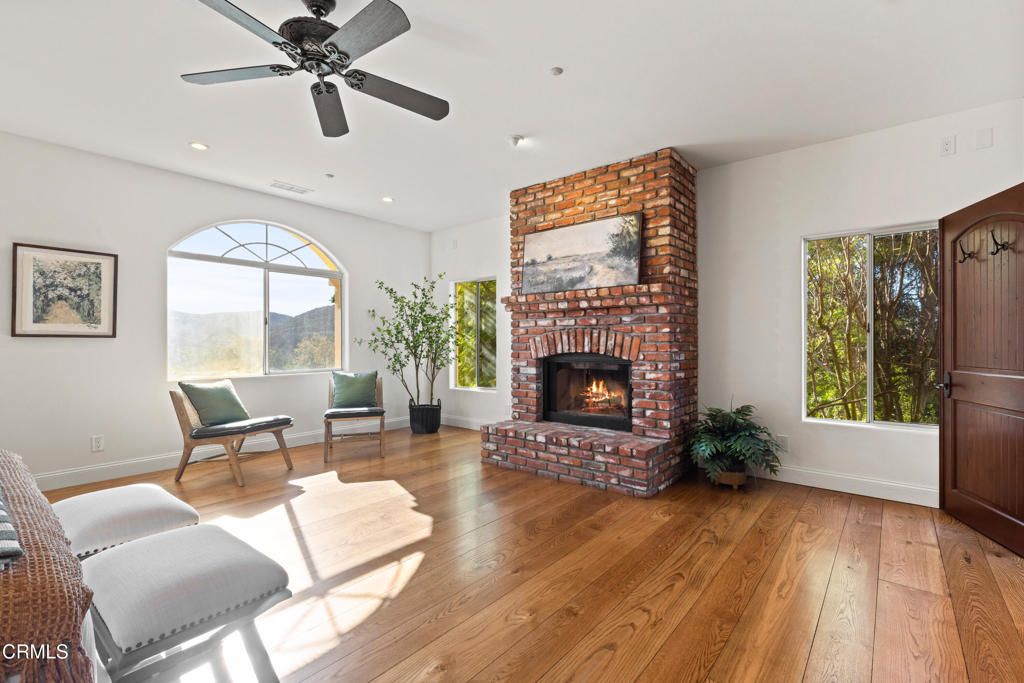 Fireplace, Interior, Recessed Lighting, Stone Walls, Wood Texture Flooring