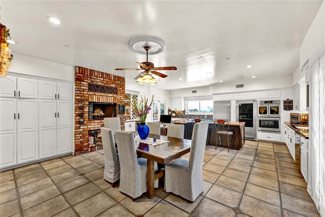 Dining room, Fireplace, Interior, Kitchen, Living room, Recessed Lighting, Stone Walls