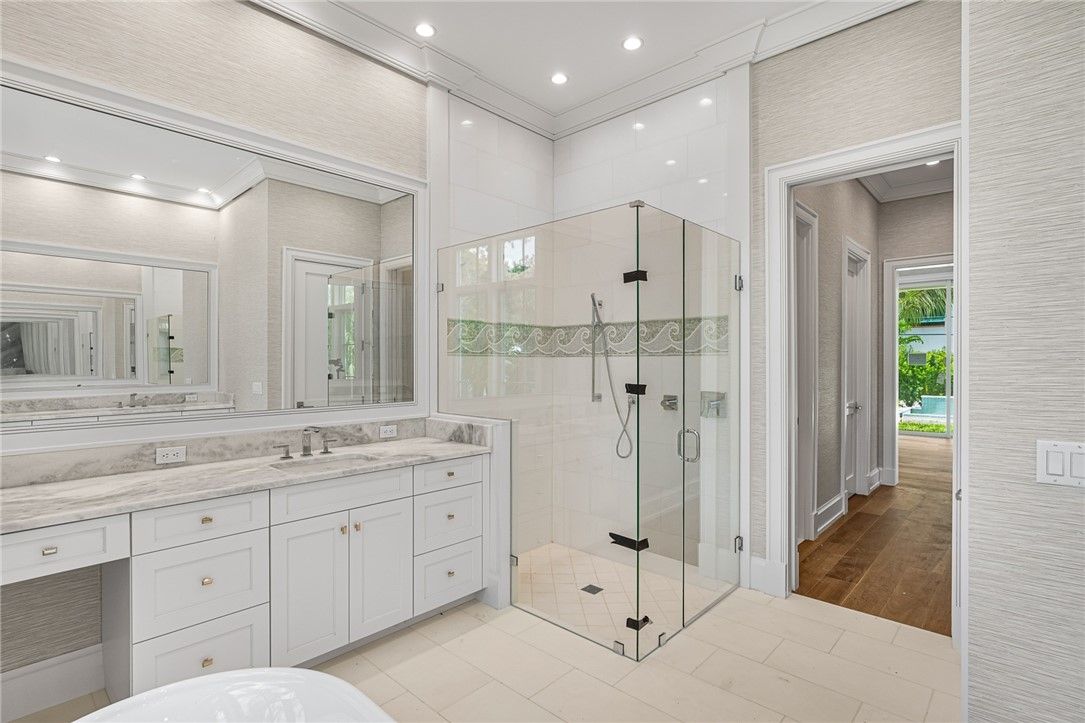 Bathroom, Dual Sink Vanities, Glass Shower, Interior, Recessed Lighting, Wood Texture Flooring