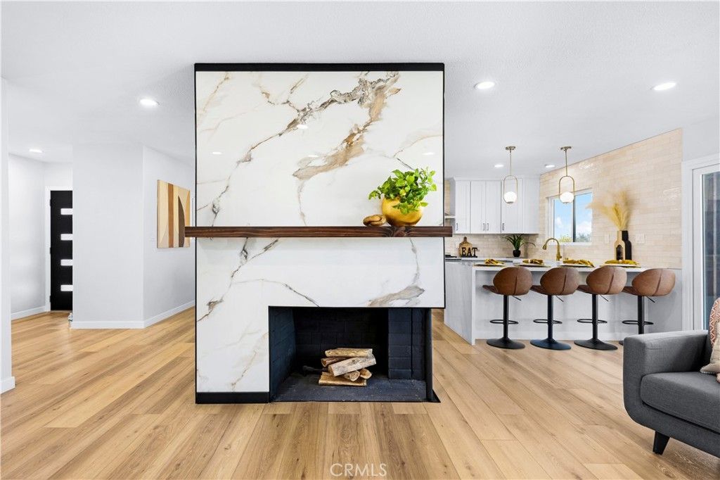 Fireplace, Interior, Kitchen, Marble Walls, Pendant Lights, Recessed Lighting, Wood Texture Flooring