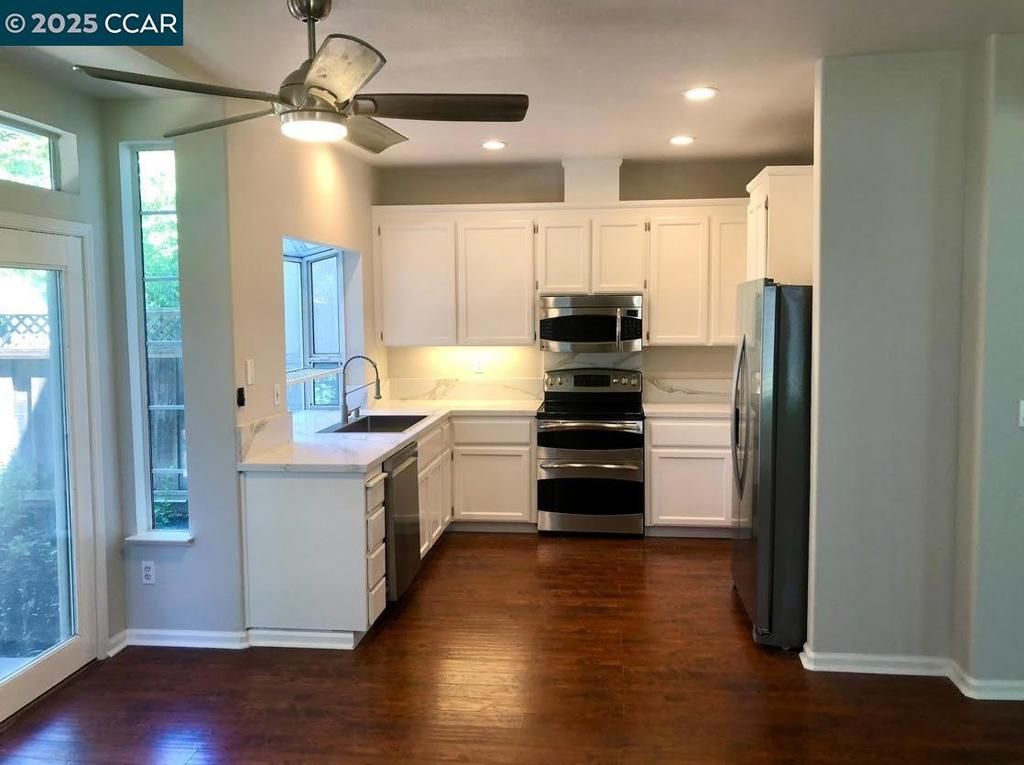 Interior, Kitchen, Recessed Lighting, Stainless Steel Appliances, Wood Texture Flooring