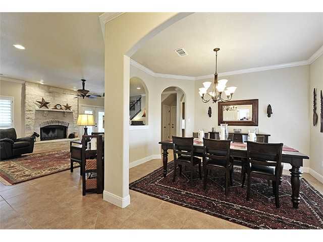 Chandelier, Dining room, Fireplace, Interior, Living room, Recessed Lighting, Stone Walls