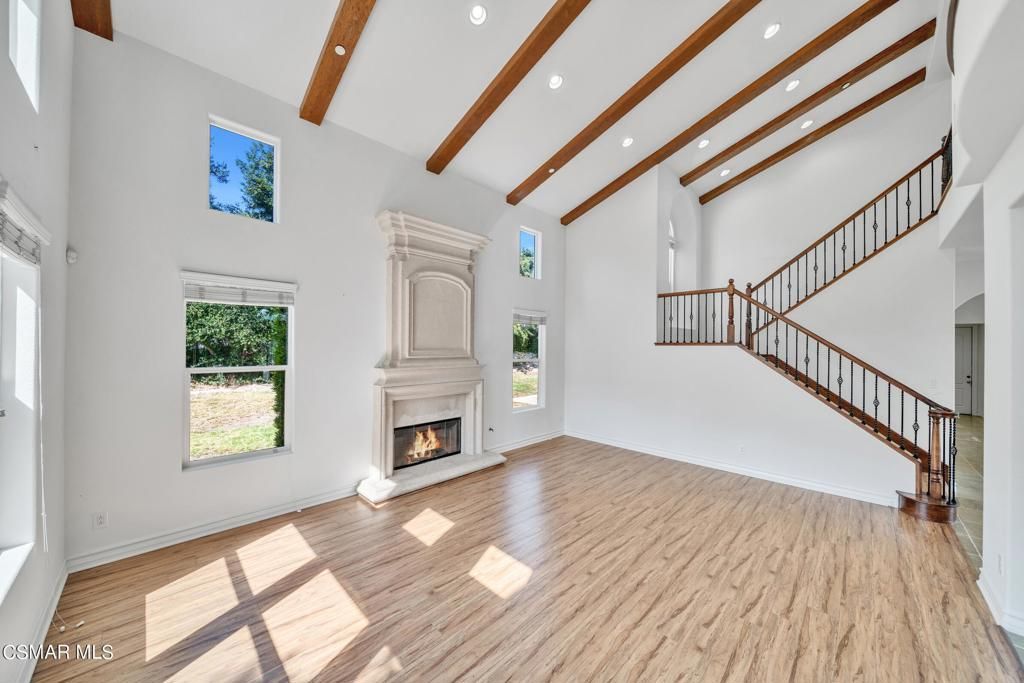 Empty room, Fireplace, Interior, Recessed Lighting, Wooden Beams, Wood Texture Flooring