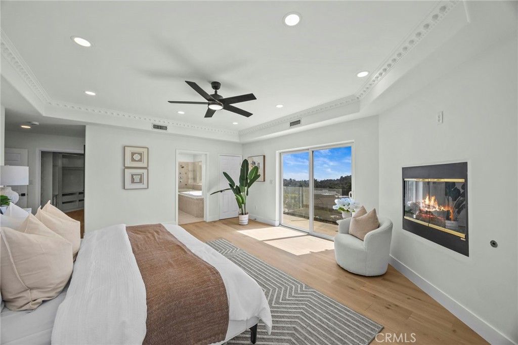 Bedroom, Fireplace, Interior, Recessed Lighting, Wood Texture Flooring