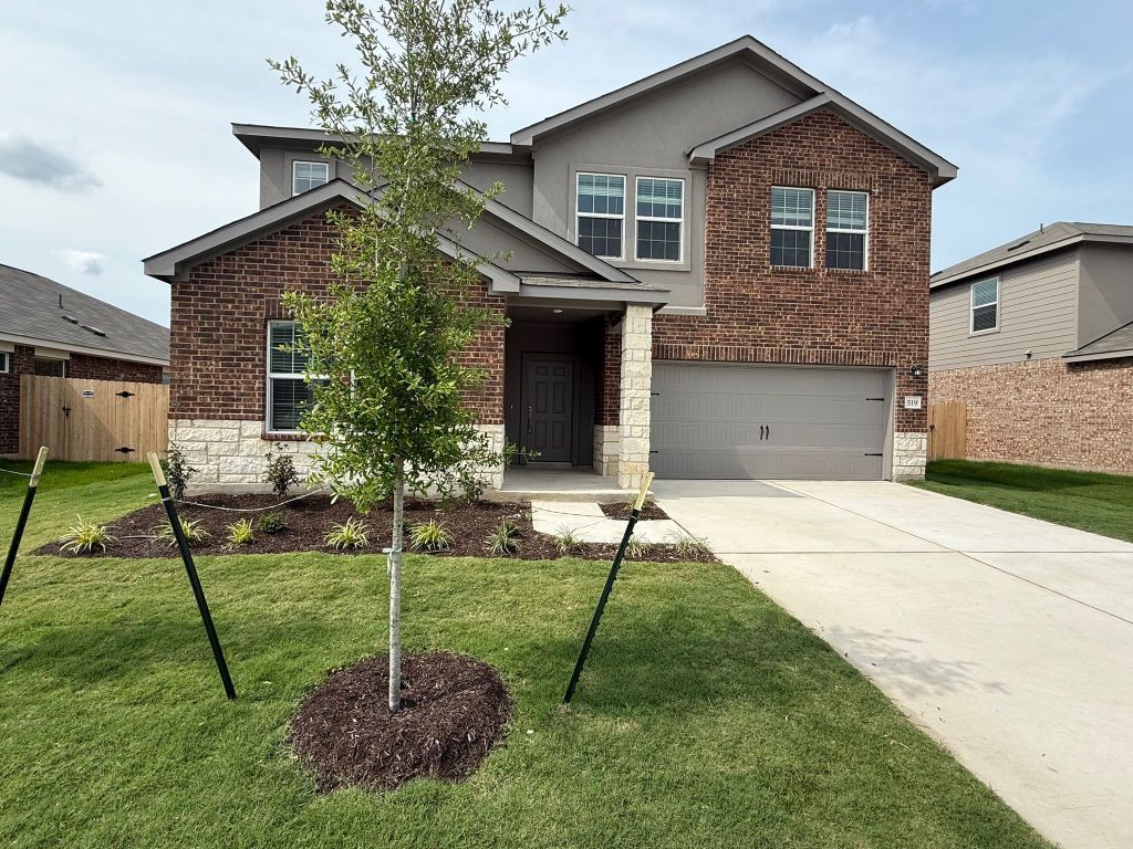 Attached, Exterior, Facade, Brick Facade, Brick Traditional