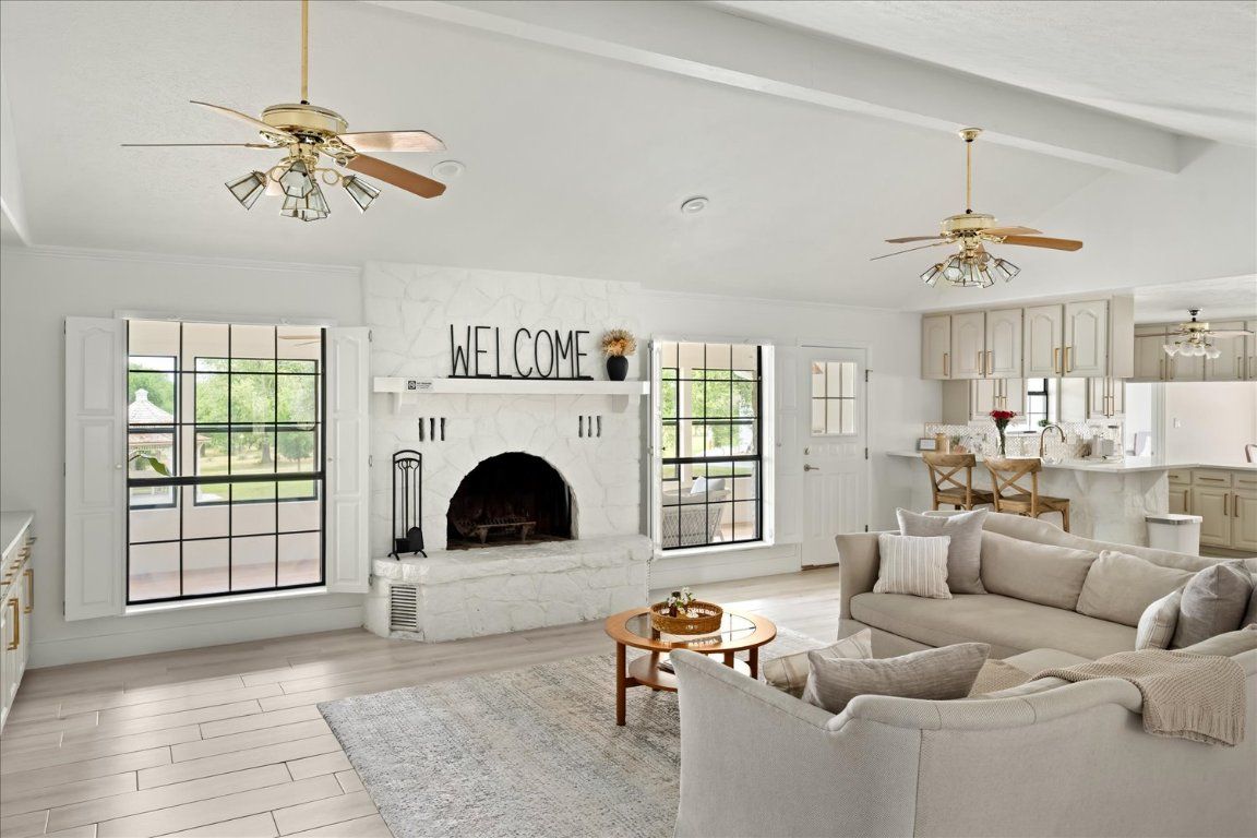 Dining room, Fireplace, Interior, Living room, Recessed Lighting, Wood Texture Flooring