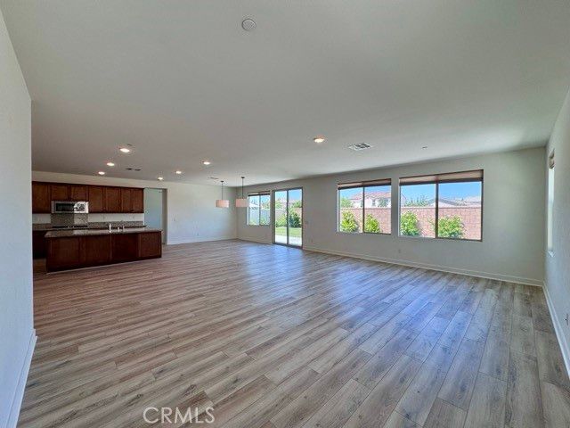 Empty room, Interior, Kitchen, Pendant Lights, Recessed Lighting, Wood Texture Flooring