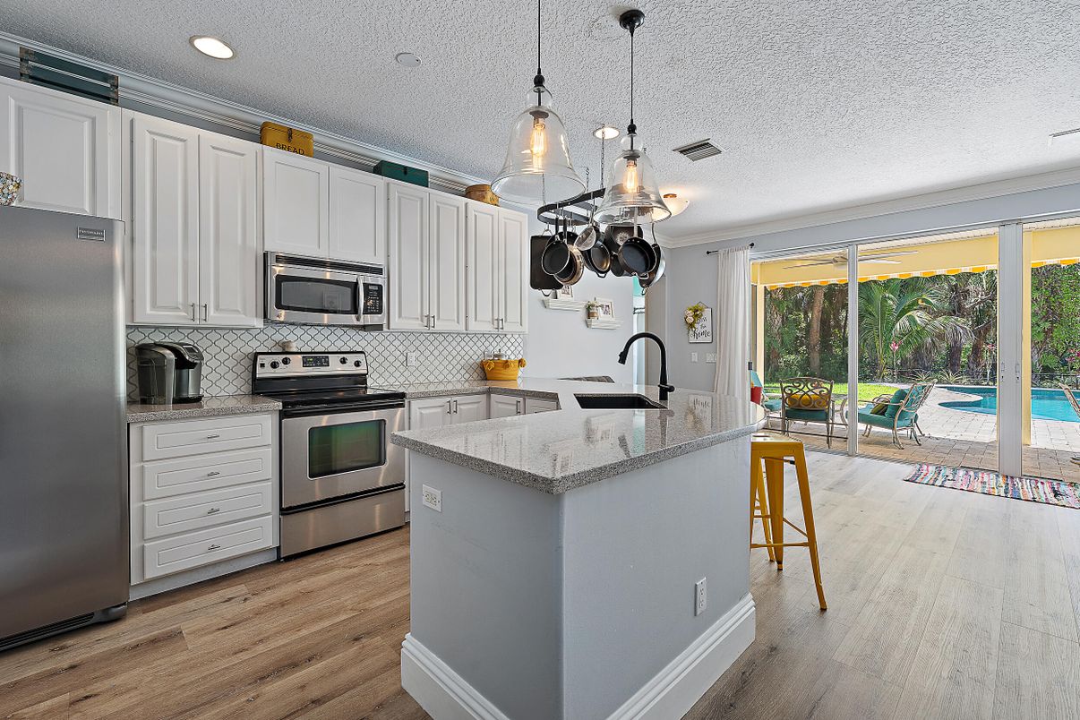Interior, Kitchen, Pendant Lights, Recessed Lighting, Stainless Steel Appliances, Wood Texture Flooring