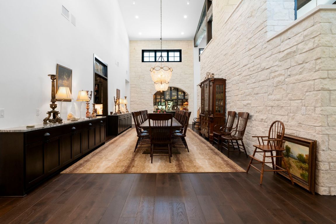 Chandelier, Dining room, Interior, Pendant Lights, Recessed Lighting, Stone Walls, Wood Texture Flooring