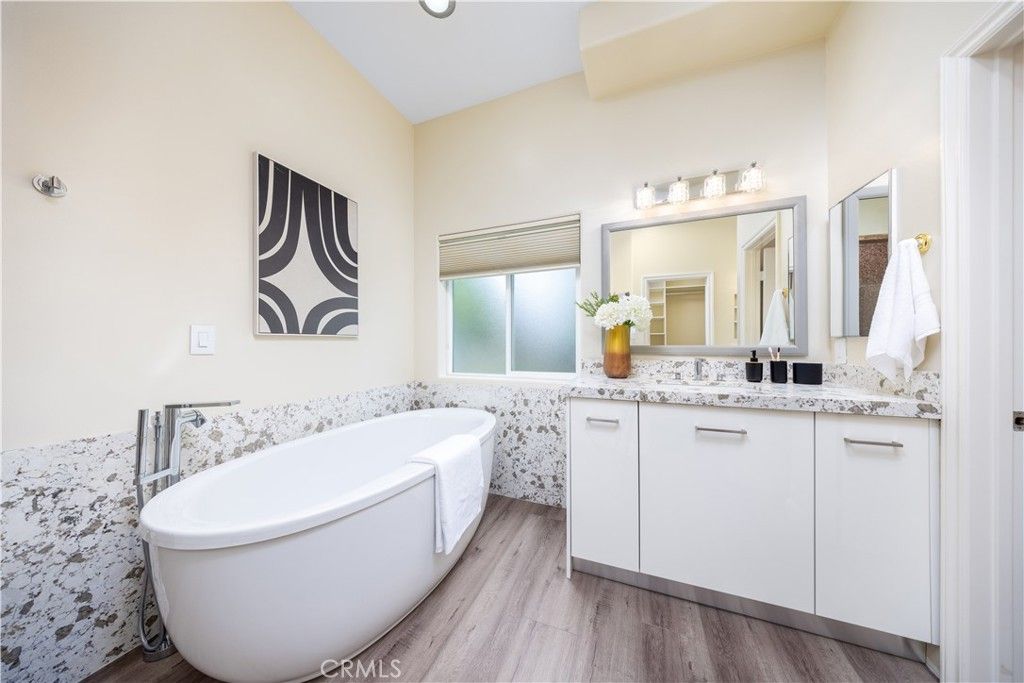 Bathroom, Dual Sink Vanities, Free Standing Baths, Interior, Recessed Lighting, Wood Texture Flooring