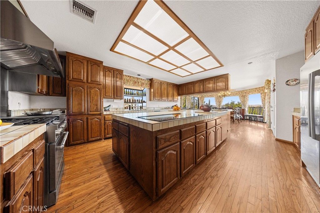 Interior, Kitchen, Tile Countertops, Wood Texture Flooring