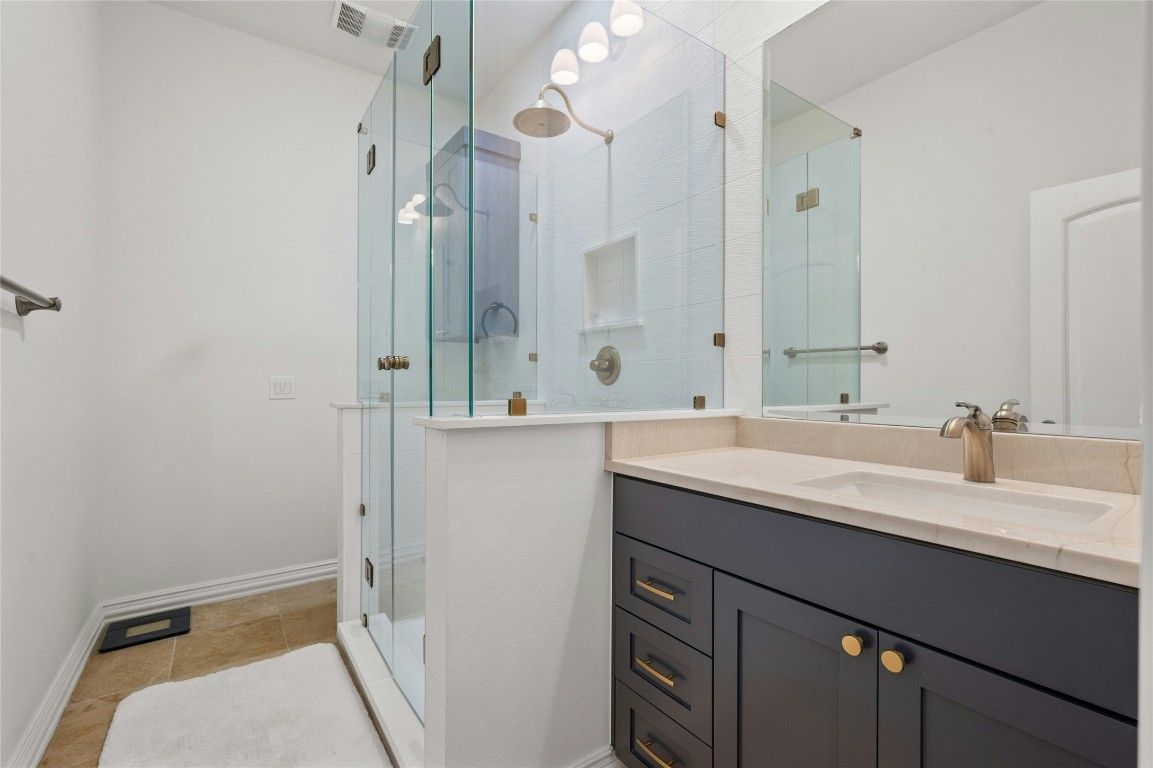 Bathroom, Dual Sink Vanities, Glass Shower, Interior, Tile Countertops