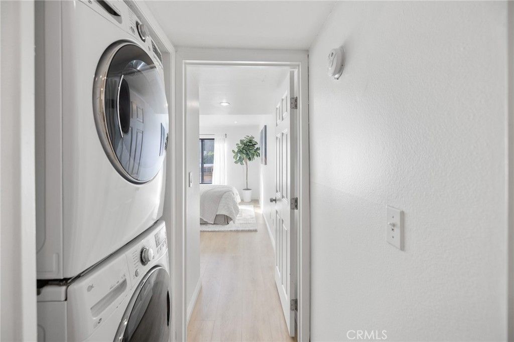 Bedroom, Interior, Recessed Lighting, Utility Closets, Washer, Wood Texture Flooring