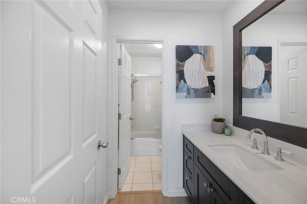 Bathroom, Dual Sink Vanities, Glass Shower, Interior, Wood Texture Flooring