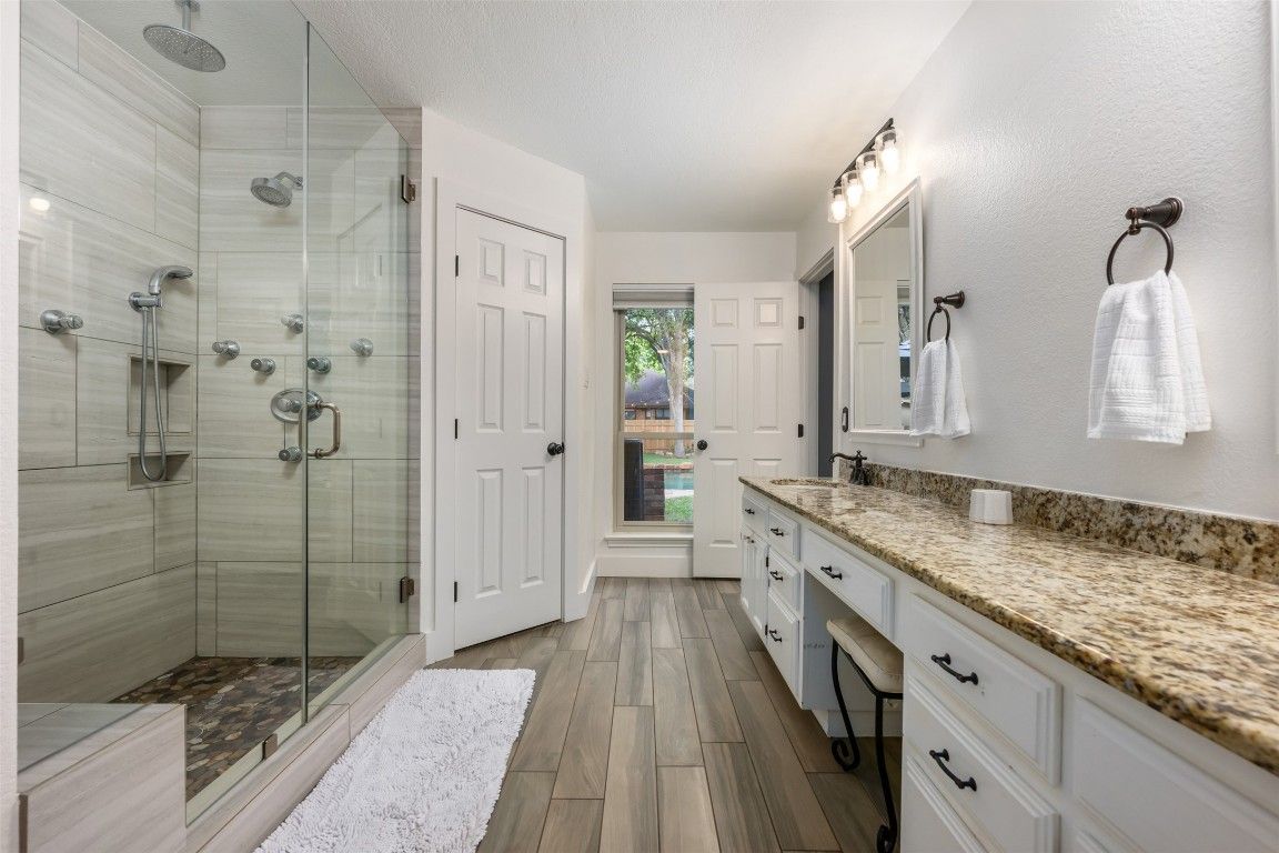 Bathroom, Dual Sink Vanities, Glass Shower, Interior, Wood Texture Flooring