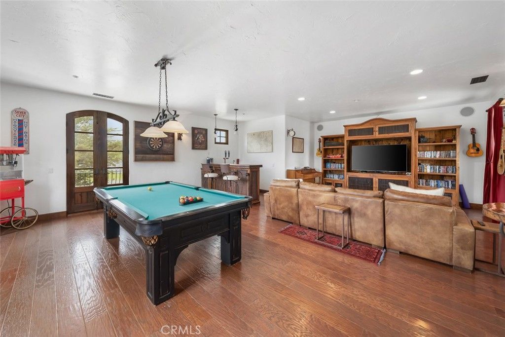 Billiard Table, Game Room, Interior, Living room, Pendant Lights, Recessed Lighting, Wood Texture Flooring