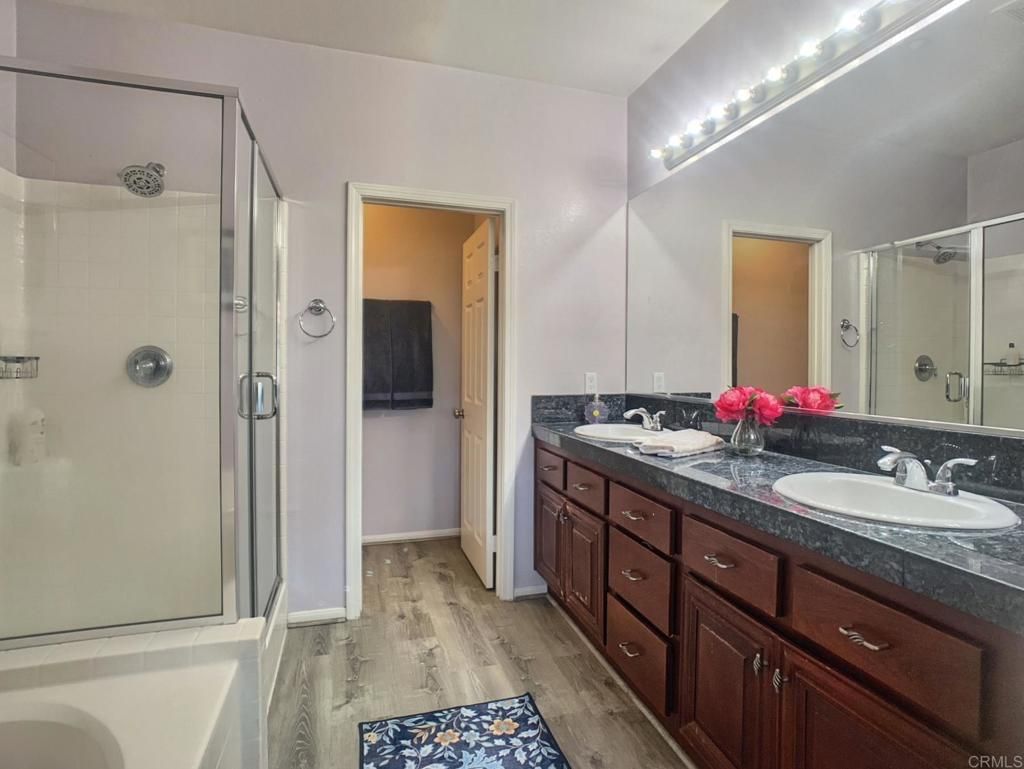 Bathroom, Dual Sink Vanities, Glass Shower, Interior, Wood Texture Flooring